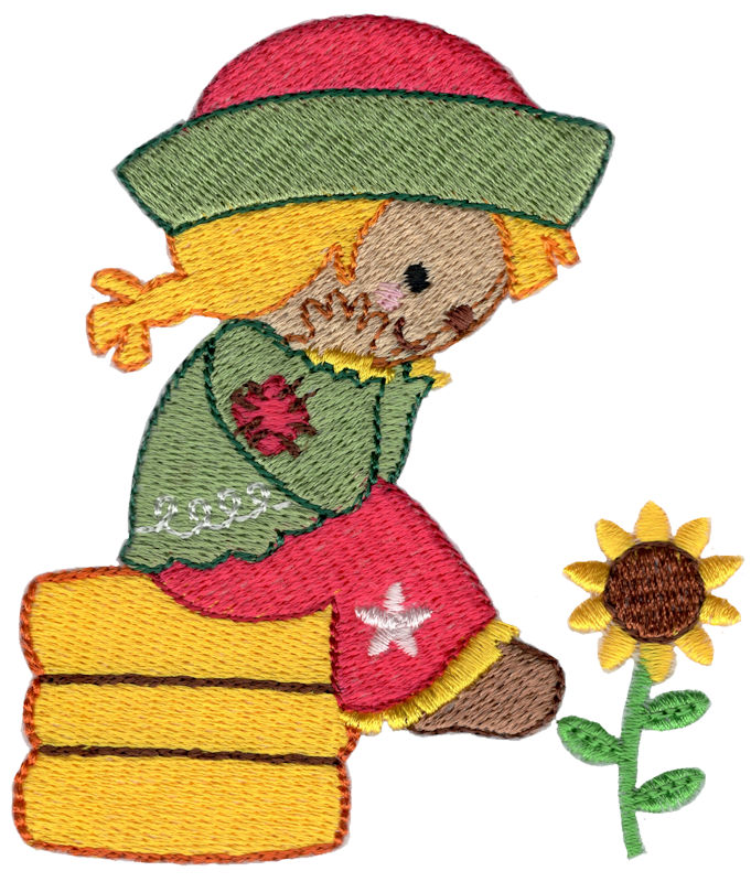 Girl Scarecrow Sitting On Haybale